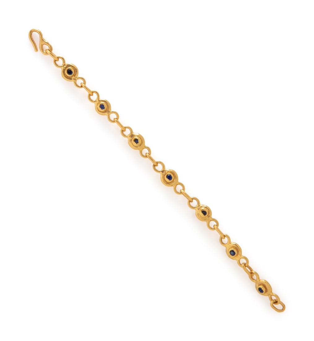 JEAN MAHIE, DIAMOND, SAPPHIRE, AND HIGH KARAT GOLD BRACELET (1 of 3)