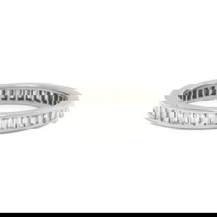 VERDURA, DIAMOND ETERNITY BAND: VERDURA, DIAMOND ETERNITY BAND Containing baguette cut diamonds weighing approximately 1.58 carats total. Mounted in platinum. Unsigned. Ring size 5 1/2. Gross weight: 2.50 dwt. Accompanied by a Verdu