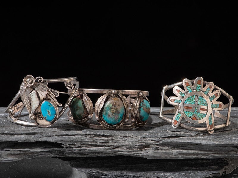 Navajo Cuff Bracelets: Navajo Cuff Bracelets third quarter 20th century lot of 3, includes: a wire example set with three turquoise stones; not marked cuff width 1-1/4 inches, interior circumference 5-1/4 inches