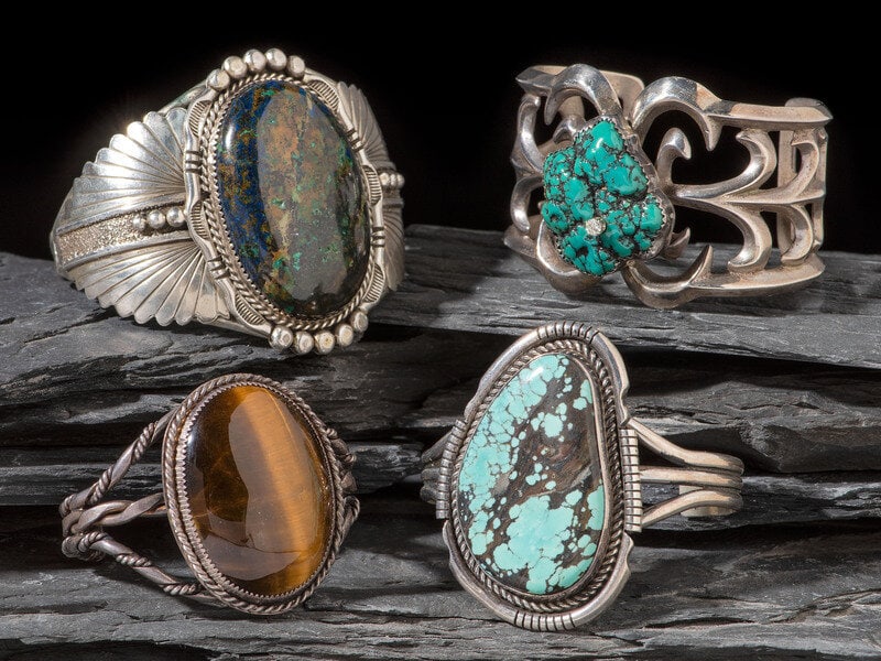 Navajo Cuff Bracelets: Navajo Cuff Bracelets third quarter 20th century lot of 4, includes: one marked DE STERLING cuff width 2-1/4 inches, interior circumference 5-1/2 inches + gap length 1-1/2 inches, weight 4