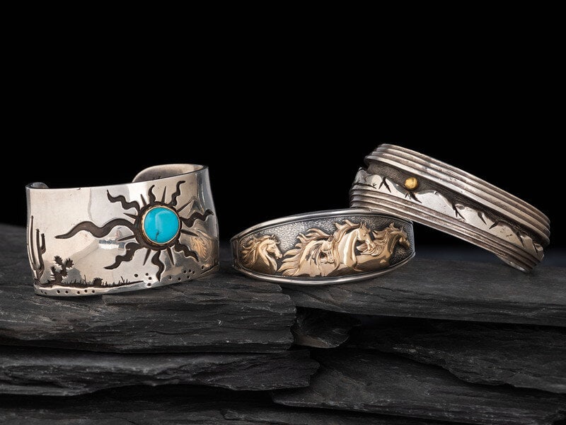 James Fendenheim 
(Tohono O'odham, 21st century)
Silver Desert Scene Cuff Bracelets with Gold Accent (1 of 2)