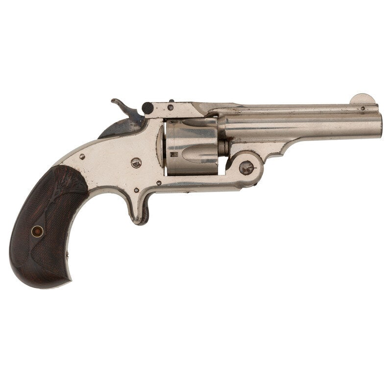 Smith & Wesson .32 Single Action Model 1 1/2 Centerfire: Smith & Wesson .32 Single Action Model 1 1/2 Centerfire .32 S&W. 3" ribbed barrel. SN: 43927. Nickel plated finish with case colored hammer and blued small parts mounting checkered hardrubber