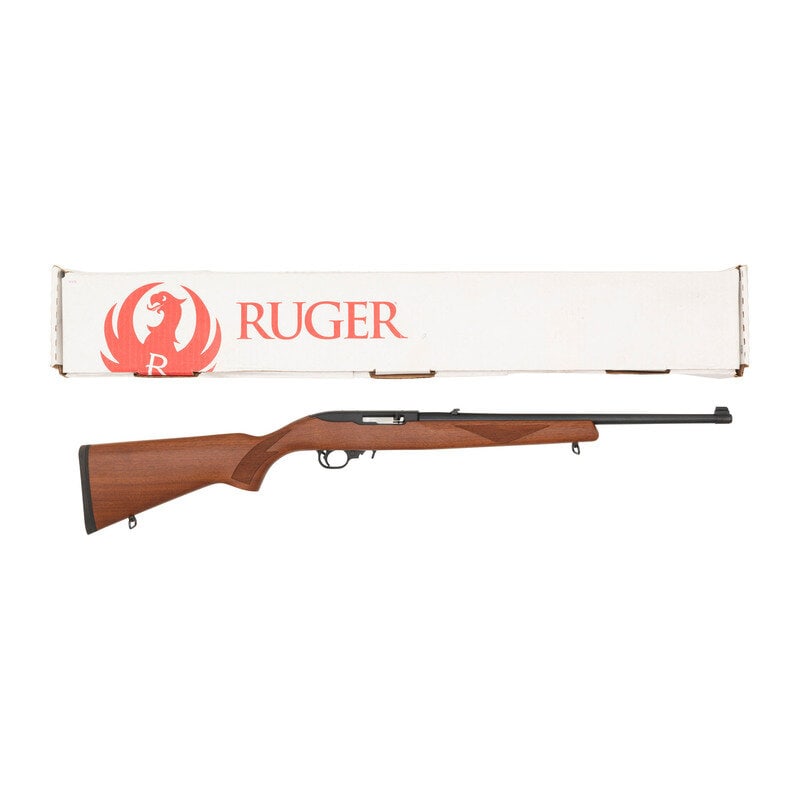 *Ruger 10/22 in Box: *Ruger 10/22 in Box .22 LR. 18.5" barrel length. SN: 0017-83431. Blued metal finish with polished bolt and black Anodized receiver in walnut semi-pistol grip stock with checkered wrist and forend. Sim