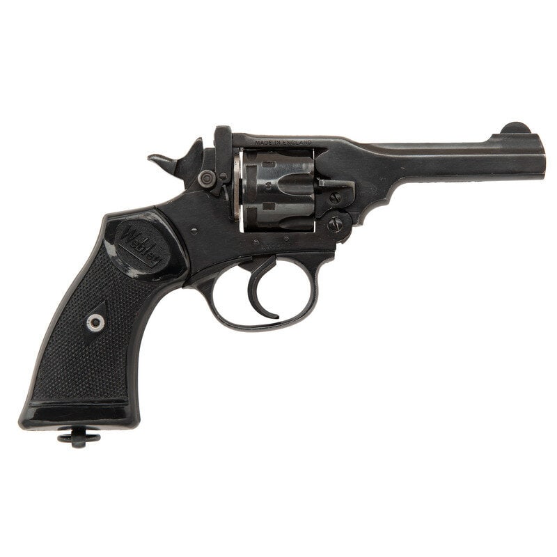 **Commercial Webley MK IV: **Commercial Webley MK IV World War II .38/200. 4" barrel length. SN: A73383. Blued metal finish mounting checkered black synthetic grips with Webley logos. Double action top break automatic-ejector r