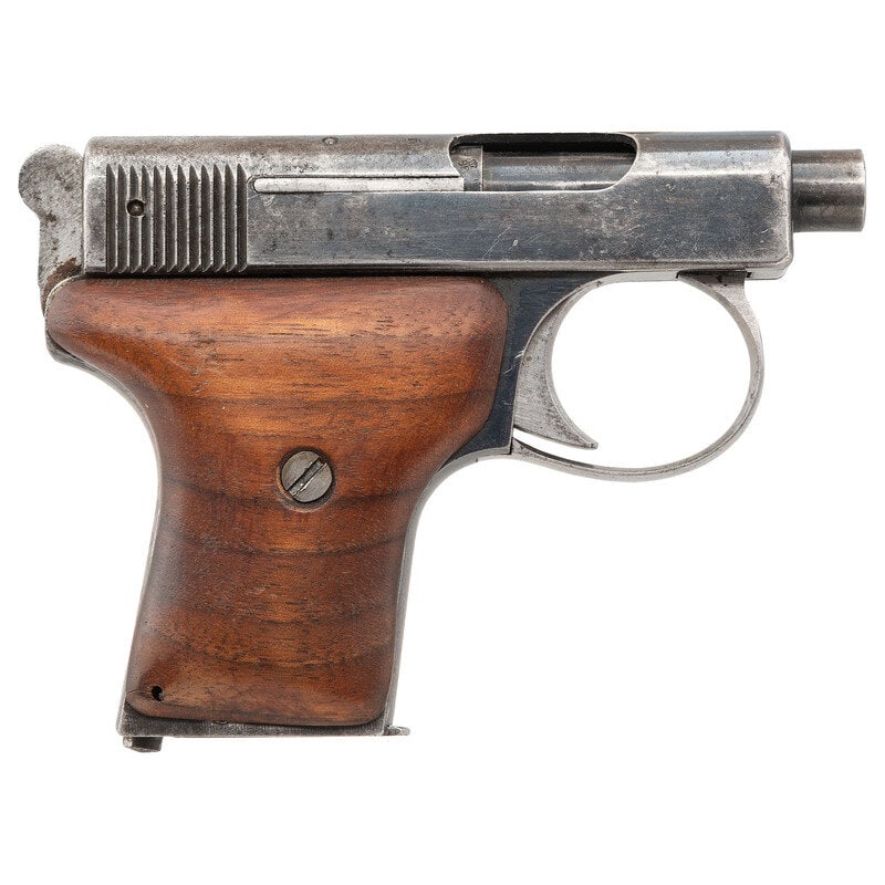 **Incomplete Webley Model 1907: **Incomplete Webley Model 1907 .25 ACP. 2.125" barrel length. SN: 18942. Blued metal finish mounting replacement oversize smooth walnut grip panels and no sights installed at factory. Single action si