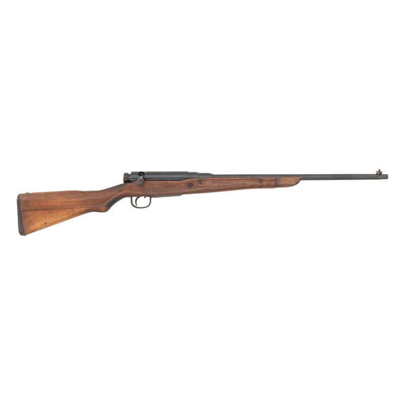 **Sporterized Type 99 Arisaka Last Ditch Rifle: **Sporterized Type 99 Arisaka Last Ditch Rifle World War II 7.7x58mm. 25.9" barrel length. SN: 58704. Blued metal finish set in Asian hardwood semi pistol grip stock with spliced toe mounting steel bu