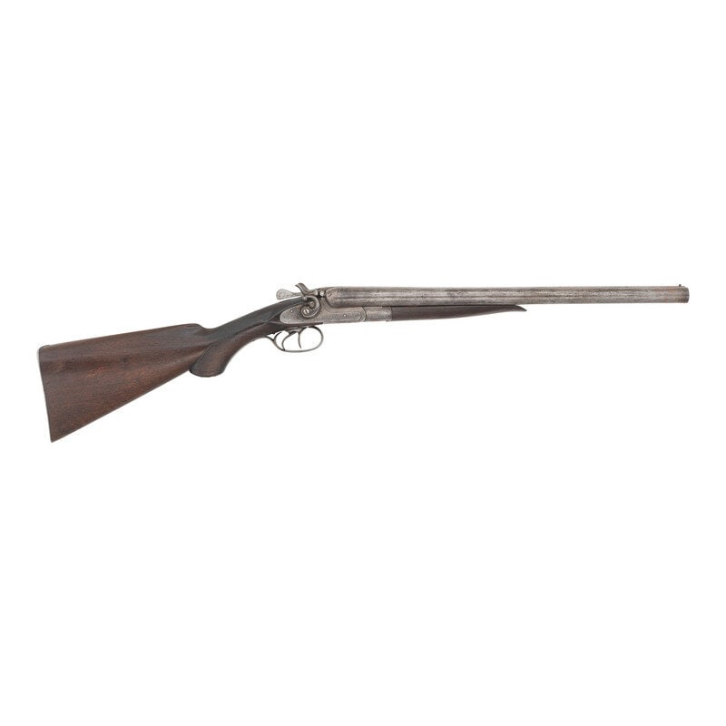 **T. Barker 12 Gauge Hammer Gun: **T. Barker 12 Gauge Hammer Gun 12 Gauge. 18.5" barrel length. SN: 3410. 2.75" chamber length. Cylinder Bores. Blued metal finish with walnut semi pistol grip stock, splinter forend, and bordered chec