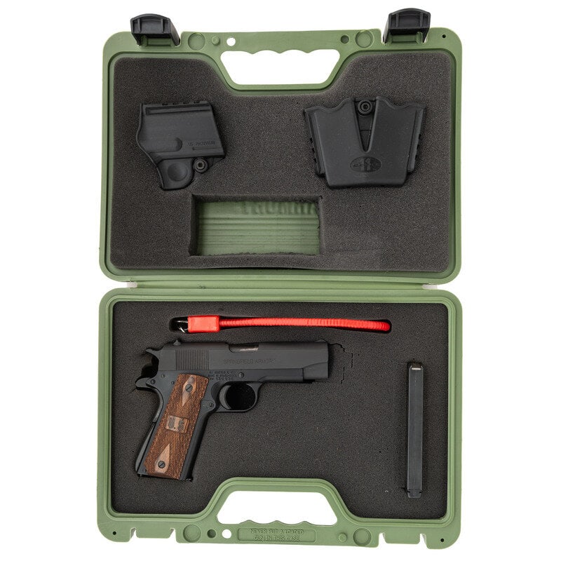 *Springfield Armory .45 Champion in Box: *Springfield Armory .45 Champion in Box .45 ACP. 4" barrel length. SN: WW135136. Parkerized metal finish with black Anodized frame mounting diamond checkered laminated wood grips with U.S. logos to bo