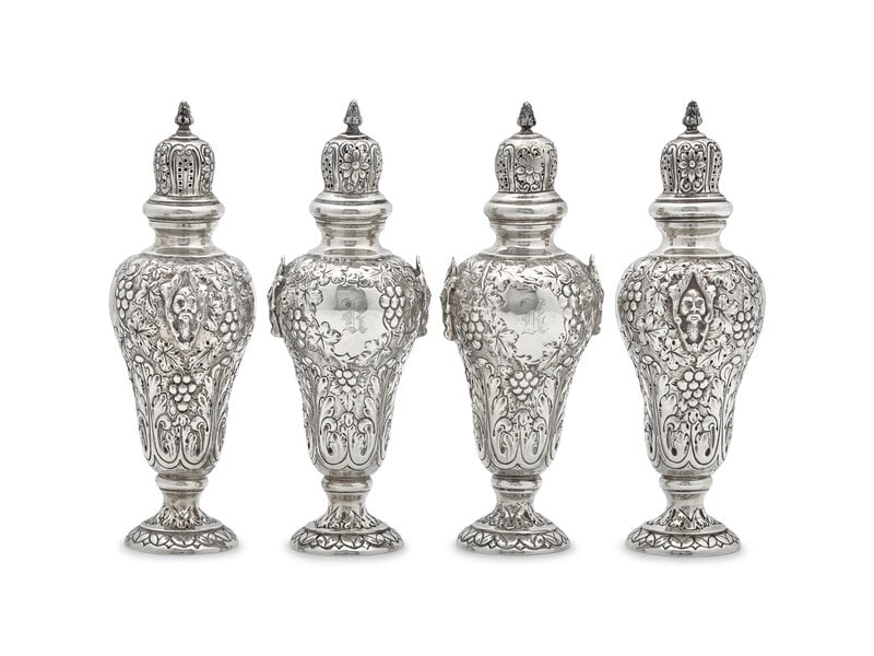 A Set of Four George V Silver Repoussé Casters (1 of 2)