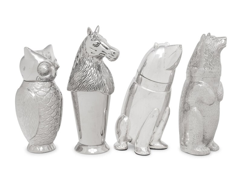 Four Animal-Form Cocktail Shakers: Four Animal-Form Cocktail Shakers 20th Century comprising a polar bear, a horse, a grizzly bear, and an owl. Height of largest example 12 inches. This lot is located in Chicago.