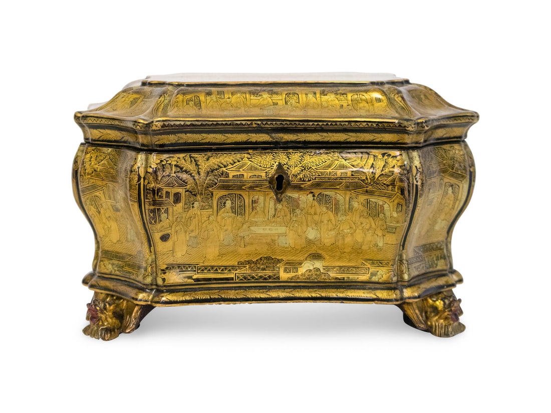 A Chinese Export Black Lacquer Gilt Decorated Tea Caddy: A Chinese Export Black Lacquer Gilt Decorated Tea Caddy 19th Century Bombe-form on carved winged dragon feet, containing two pewter lidded tea canisters. Height 6 x width 10 x depth 8 inches. This lot