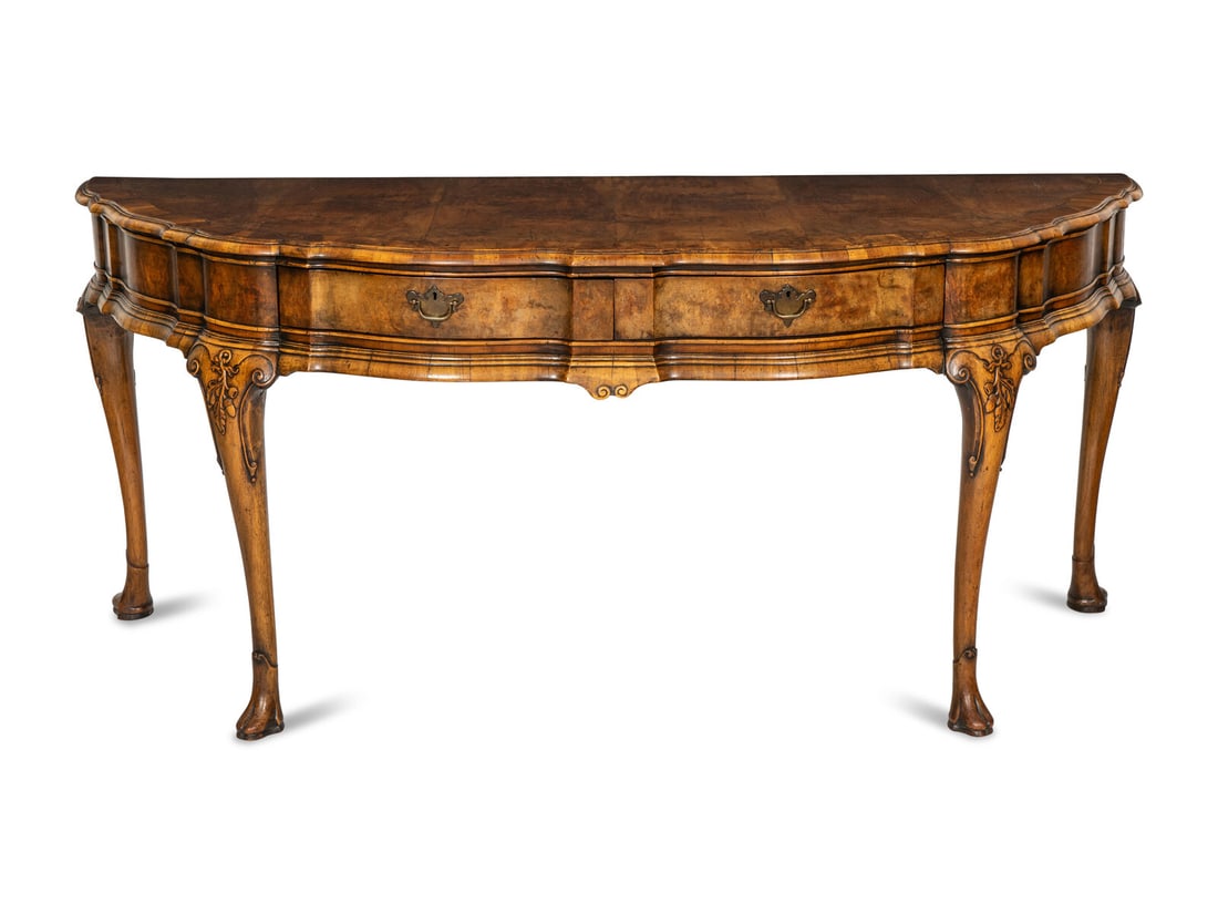 A Large Queen Anne Style Burl Walnut Demilune Console Table: A Large Queen Anne Style Burl Walnut Demilune Console Table 19th Century Serpentine front with 2 drawers and elaborate herringbone inlay detailing. Height 34 1/2 x width 77 x depth 29 inches. This lot