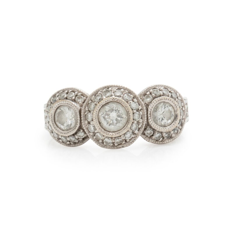WHITE GOLD AND DIAMOND RING: WHITE GOLD AND DIAMOND RING Round brilliant cut diamonds weighing approximately 1.00 carat total. White gold. Ring size 3 1/4. Gross weight: 3.55 dwt. This lot is located in Chicago. </