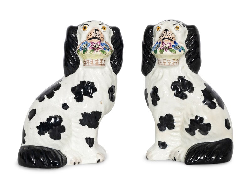 A Pair of Staffordshire Pottery Disraeli Spaniels with Floral Baskets : A Pair of Staffordshire Pottery Disraeli Spaniels with Floral Baskets England, Circa 1850 Bearing a tag to underside from Lynda Willauer Antiques (Nantucket, Massachusetts). Height