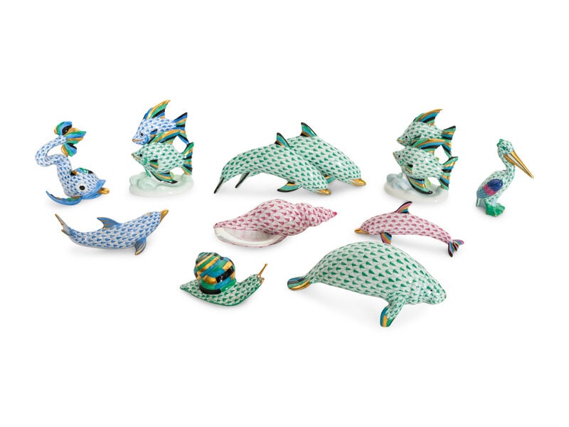 A Collection of Ten Herend Fishnet Porcelain Animal Figures: A Collection of Ten Herend Fishnet Porcelain Animal Figures Hungary, 20th Century Length of Dolphin Figure, 7 inches. This lot is located in Palm Beach. Property from the