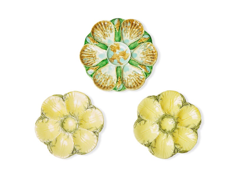 A Group of Three Majolica Oyster Plates: A Group of Three Majolica Oyster Plates Circa 1880 comprising a pair by Sarreguemines, France, and a single plate, impressed with anchor motif to underside. Diameter 10 1/2 inches (largest). <