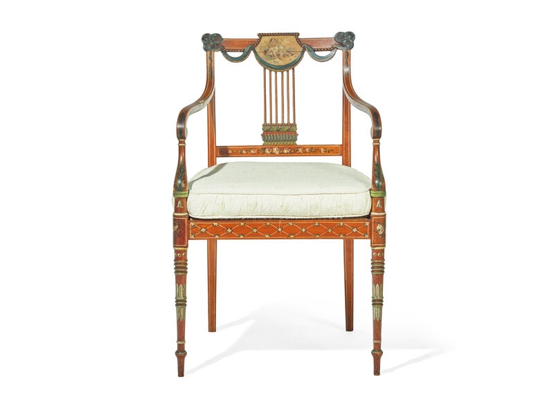 An Edwardian Painted Armchair: An Edwardian Painted Armchair 19th / Early 20th Century with caned seat and custom fitted cushion. Height 35 inches x width 22 inches x depth 20 inches. This lot is located in Philade