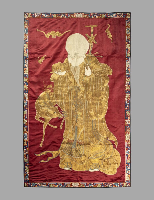A Large Chinese Red Ground Embroidered Silk 'Longevity' Panel (1 of 4)