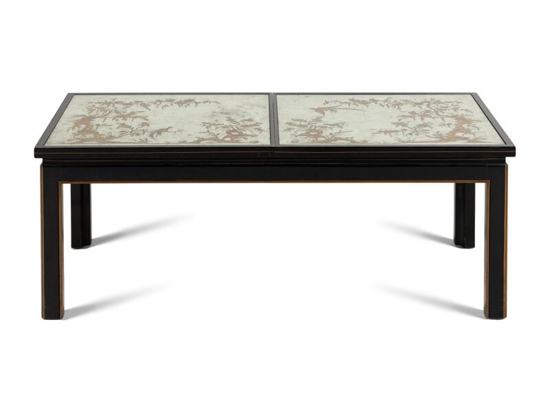 An Ebonized and Parcel Gilt Églomisé-Top Low Table: An Ebonized and Parcel Gilt Églomisé-Top Low Table 20th Century the top panels sliding open to reveal an interior storage compartment in the center. Height 17 x width 46 1/4 x depth 21 7/8 i