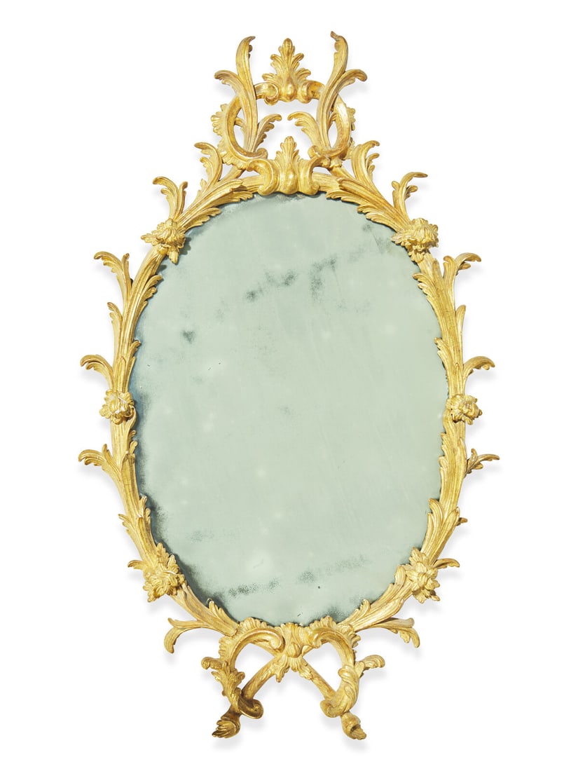 A George III Carved Giltwood Mirror: A George III Carved Giltwood Mirror Circa 1780 Height 44 x width 26 inches. This lot is located in Philadelphia. Property from the Buck Family Collection, Philadelphia Provenance: M. Comer of London, 