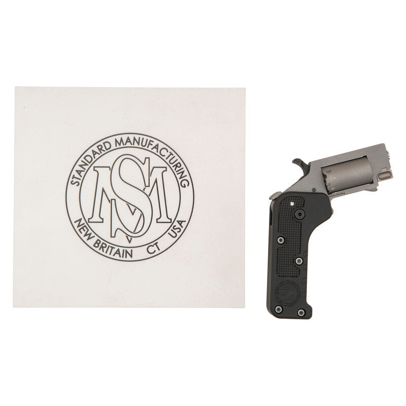 *Standard Manufacturing Switch Gun Pocket Revolver In Factory Box: *Standard Manufacturing Switch Gun Pocket Revolver In Factory Box .22 Magnum. 0.625" barrel length. SN: SG001518. Matte stainless steel finish overall with matte black synthetic grip featuring blued h
