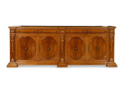 A Large Italian Baroque Style Fruitwood Credenza: A Large Italian Baroque Style Fruitwood Credenza 20th Century Of bench-made quality. Height 42 1/2 x width 115 x depth 22 1/2 inches. Property from the Collection of Raphael Yakoby, New York This lot