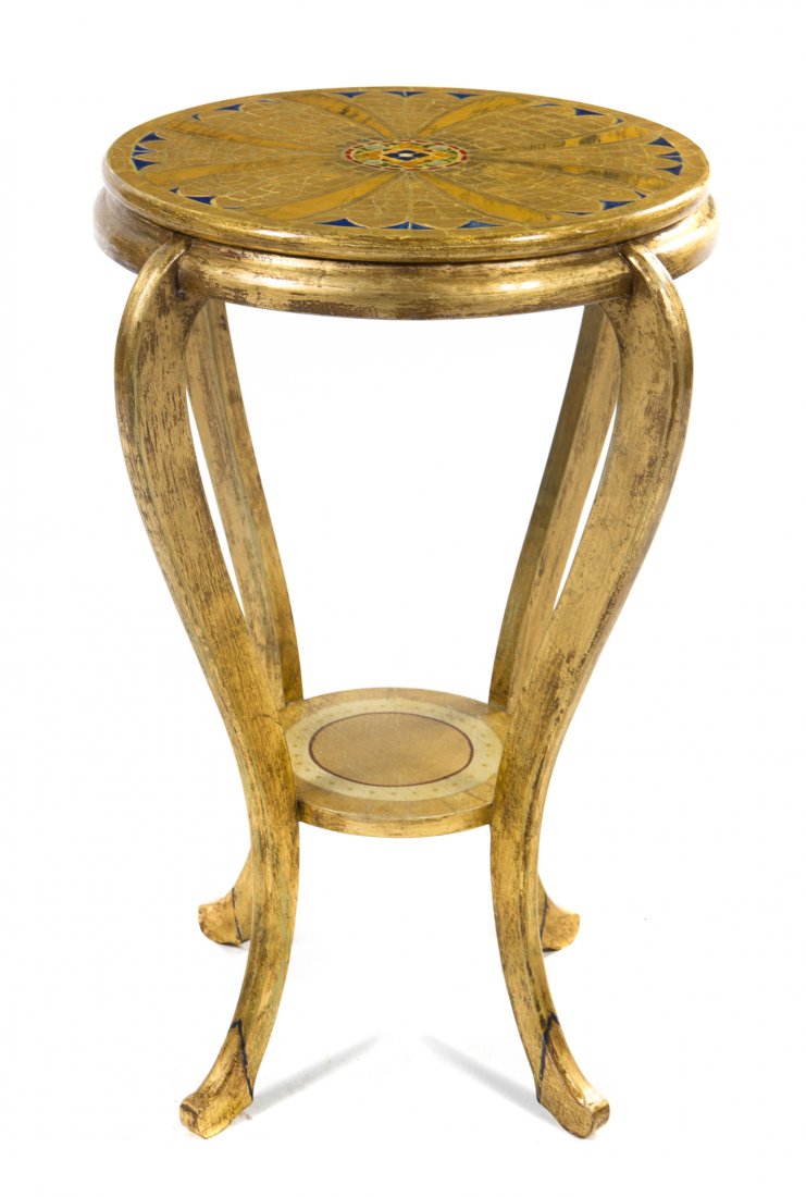 A Giltwood and Polychrome Decorated Occasional Ta: A Giltwood and Polychrome Decorated Occasional Table, the circular top raised on cabriole legs, joined by a medial shelf. Height 29 x diameter 17 inches.