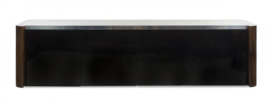 A Vladimar Kagan Rosewood Wall Mount Sideboard, H: A Vladimar Kagan Rosewood Wall Mount Sideboard, having a rectangular top with rounded corners and a conforming inset mirror over four doors, the middle two with drawers and the outer two with shelved 
