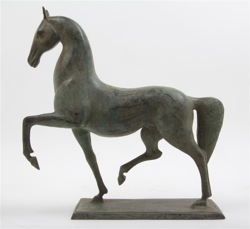 A Cast Metal Model of a Horse, Height 17 1/2 inch: A Cast Metal Model of a Horse, depicted in stride and set on a rectangular base. Height 17 1/2 inches.