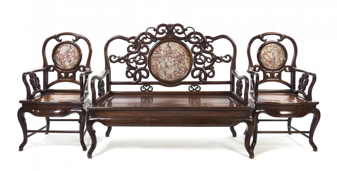 A Chinese Hardwood Parlour Suite, Height of sette: A Chinese Hardwood Parlour Suite, comprising four chairs, a settee and an occasional table, each having a shaped crest rail over the openwork backs and arms having intertwining scrollwork, the backs c
