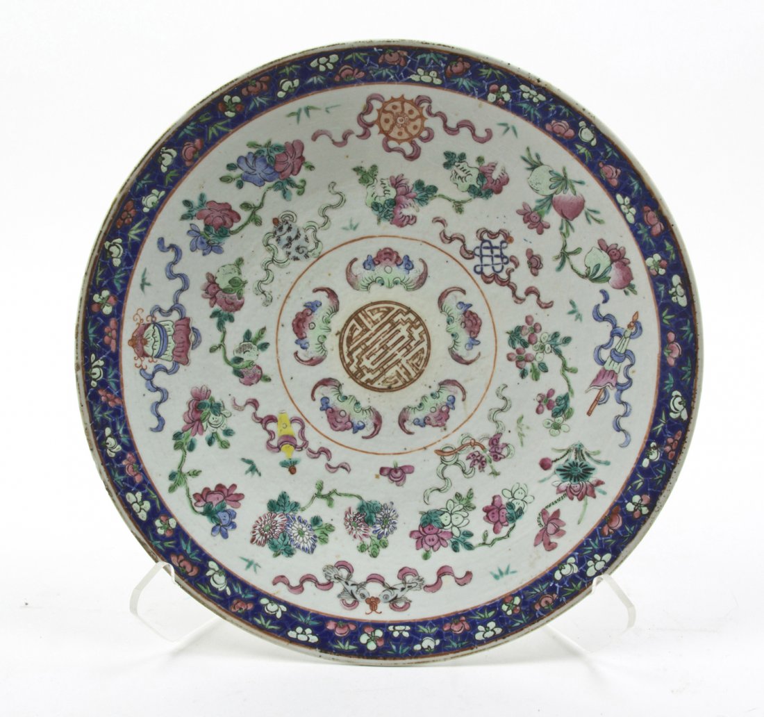 A Chinese Polychrome Enameled Charger, Diameter 1: A Chinese Polychrome Enameled Charger, of circular footed form, the interior decorated with eight Buddhist emblems around five bats surrounding the central shou medallion, the exterior having iron red
