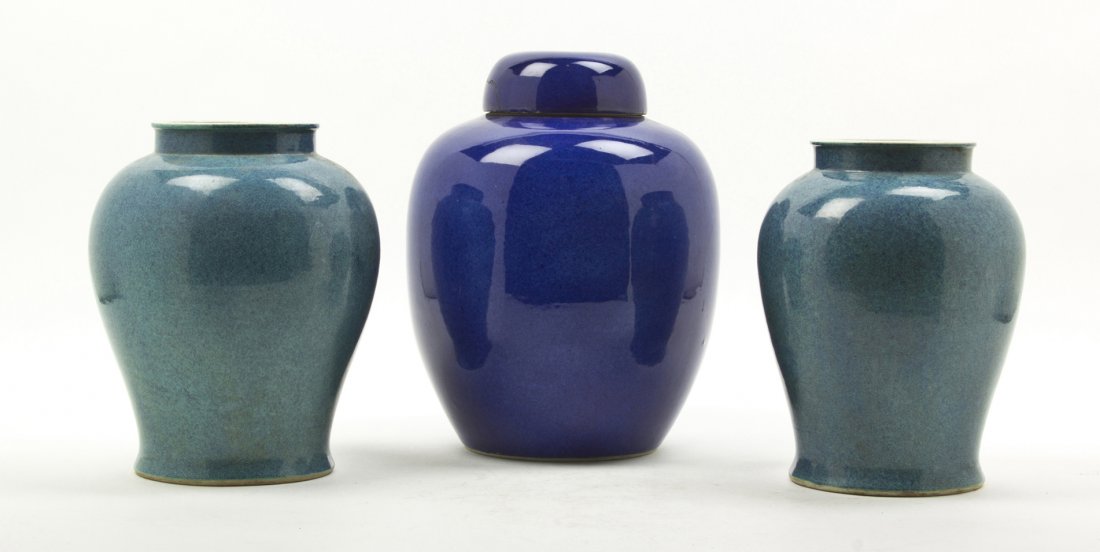 A Monochrome Lidded Ginger Jar, Height of first 1: A Monochrome Lidded Ginger Jar, bearing six-character Kangxi reign mark in double ring to the underside, together with a pair of robin's egg blue baluster vases. Height of first 12 inches. Condition: 