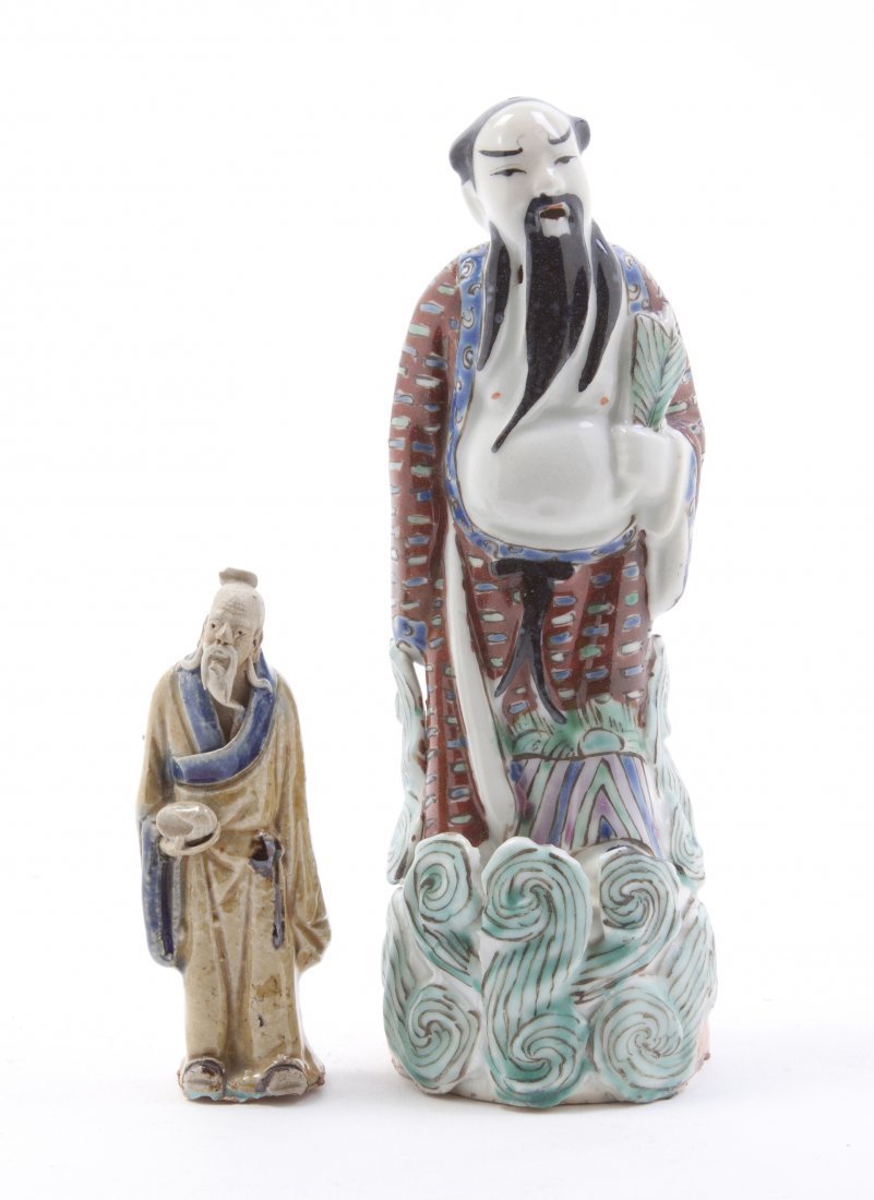 A Group of Ceramic Figures, Height of tallest 6 7: A Group of Ceramic Figures, comprising a Chinese famille verte figure of an immortal, together with a Japanese figure of a man. Height of tallest 6 7/8 inches. Property from the Estate of Mr. Charles 