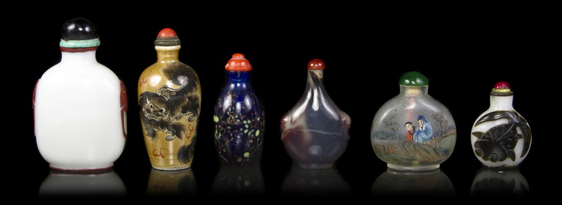 A Collection of Five Glass Snuff Bottles, Height : A Collection of Five Glass Snuff Bottles, of various forms, together with a ceramic bottle. Height of tallest 2 3/4 inches. Property from the Collection of Roger and Jean Holler, Maitland, Florida