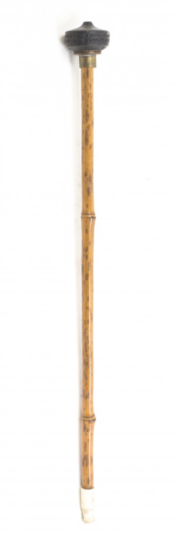 A Chinese Bamboo Opium Pipe, Length 17 1/2 inches: A Chinese Bamboo Opium Pipe, having a metal pipe end inscribed Zhang Zhiyun, with a carved bone mouthpiece. Length 17 1/2 inches. Property from the Elizabeth Price Welch Legacy Collection, Chicago, Il