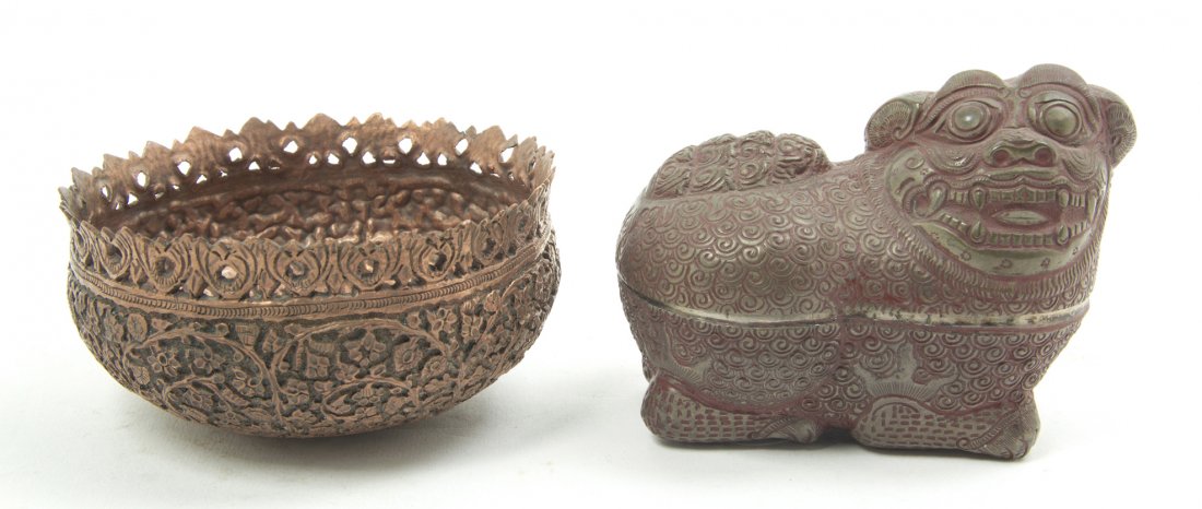 Two Southeast Asian Articles, Diameter 3 7/8 inch: Two Southeast Asian Articles, comprising a copper bowl of circular form, having relief vine and bud decoration throughout and a silvered metal figural box with lid, in the form of a fu dog. Diameter 3