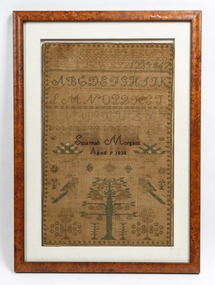 An American Needlepoint Sampler, Height 15 x widt: An American Needlepoint Sampler, dated 1838, depicting the alphabet in various typeface, set in a burlwood frame. Height 15 x width 9 1/2 inches.