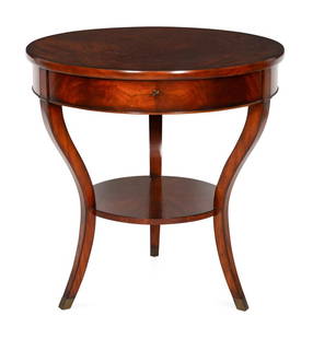 A Contemporary Mahogany Center Table: A Contemporary Mahogany Center Table With medial shelf, on gilt metal sabots Height 30 1/2 x diameter 30 inches. Property from the Collection of Raphael Yakoby, New York