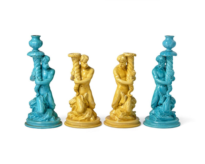 Two Pairs of Wedgwood Majolica ‘Triton’ Figural Candlesticks: Two Pairs of Wedgwood Majolica ‘Triton’ Figural Candlesticks Late 19th Century After the model by Matthew Boulton; impressed Wedgwood stamps. Height of the blue pair 13 inche
