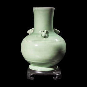 A Chinese Celadon Glazed Porcelain 'Three Rams' Vase, Late Qing Dynasty 清晚期