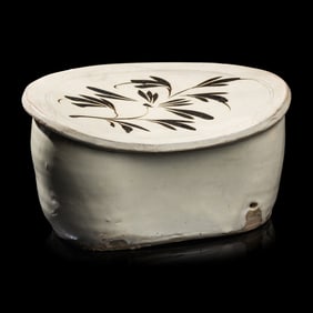 A Chinese Cizhou-Type White Glazed 'Floral' Porcelain Pillow, Yuan Dynasty 元 磁州