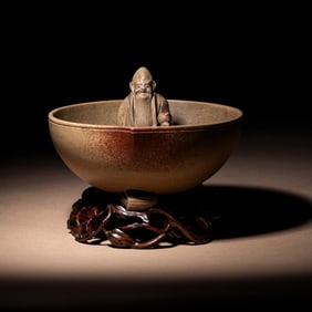 A Rare Yixing Peach-Form 'Figure' Puzzle Cup with Impressed Seals 'Chen', 'Mingyuan' and Wood Stand