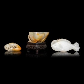 Two Chinese Jade Ornaments and A Jadeite 'Lotus Leaf' Brush Washer, Qing Dynasty 清 黃
