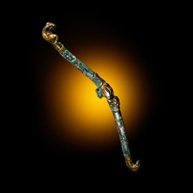 A Chinese Gilt, Silvered and Turquoise Inlaid Bronze Belt Hook, Warring States Period 戰
