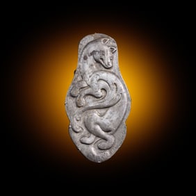 A Chinese Silver 'Winged Fox' Harness Ornament, Northeast China, Xianbei Tribe, Han-Jin Dynasty