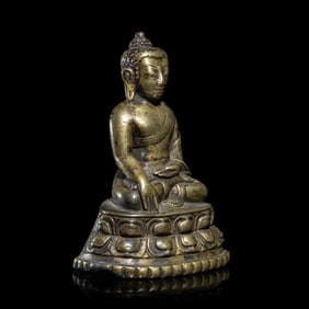 A Tibetan Copper Alloy Figure of Buddha Shakyamuni, 14th/15th Century 十四/十