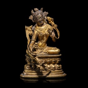 A Gilt Copper Alloy Seated Figure of Tara, in the Style of 11th/12th Century 十一