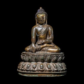 A Tibetan Gilt Copper Alloy Figure of Buddha Shakyamuni, 14th/15th Century 十四/十