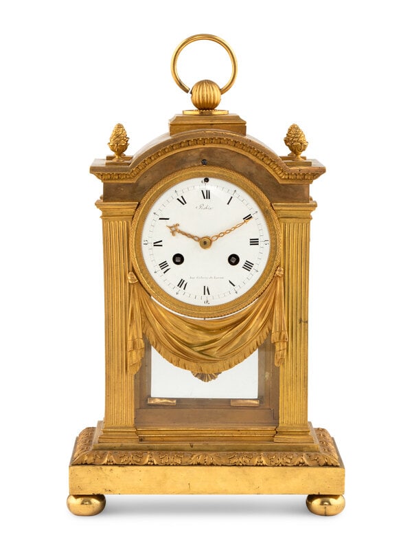 A Louis XVI Gilt Bronze Mantel Clock: A Louis XVI Gilt Bronze Mantel Clock Late 18th Century the movement and dial both signed Robin à Paris. Height 15 x width 8 1/4 x depth 5 inches. This lot