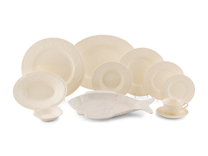 A Wedgwood Patrician Dinner Service: A Wedgwood Patrician Dinner Service comprising: 14 dinner plates 14 dessert plates 14 bread plates 14 tea cups and saucers 14 dessert bowls 14 rimmed soup bowls 1 ova